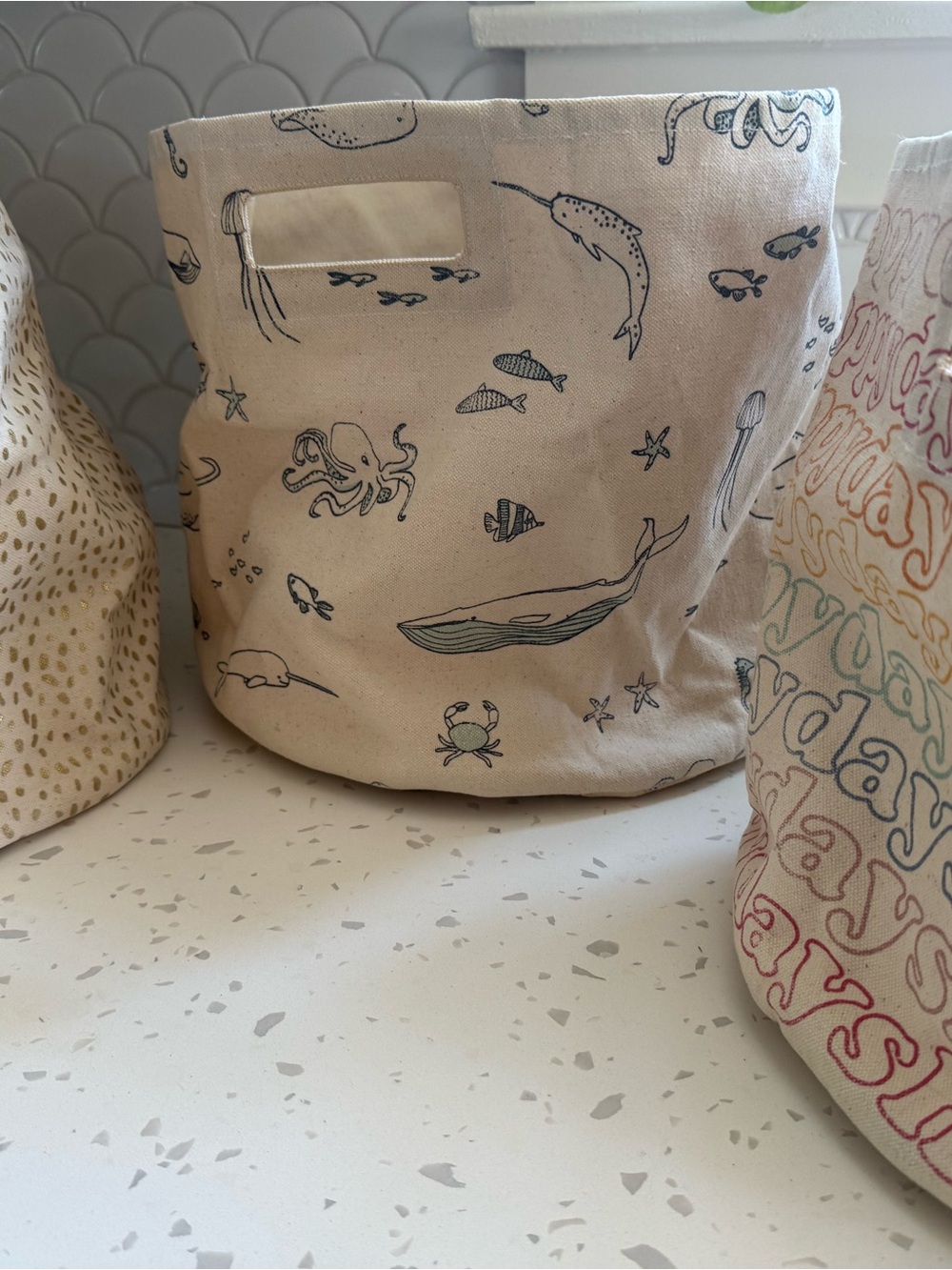 Set of 3 Pehr storage bags for kids toys.
